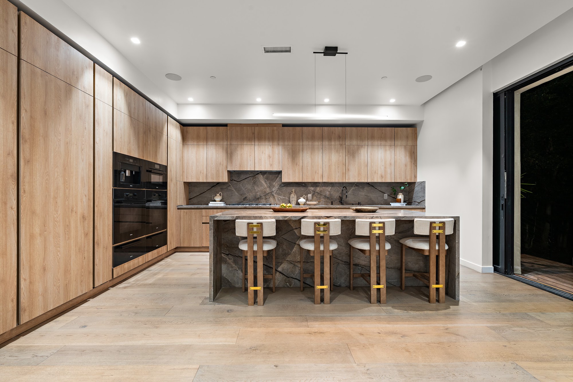 Keswick Conservatory — kitchen with island and full-height cabinetry