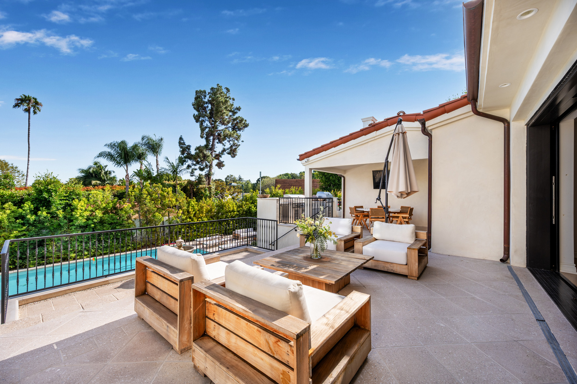 Tower Vista — pool terrace with loungers