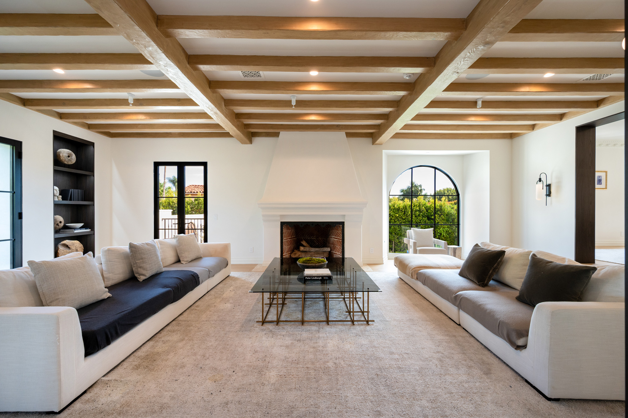 Tower Vista — living room with fireplace and beamed ceiling