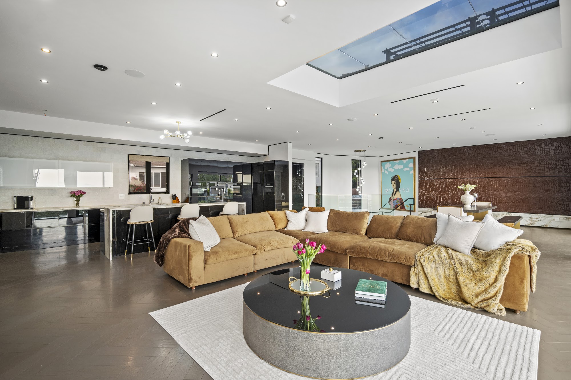 Sunset Plaza Promontory — living room with skylight and open kitchen