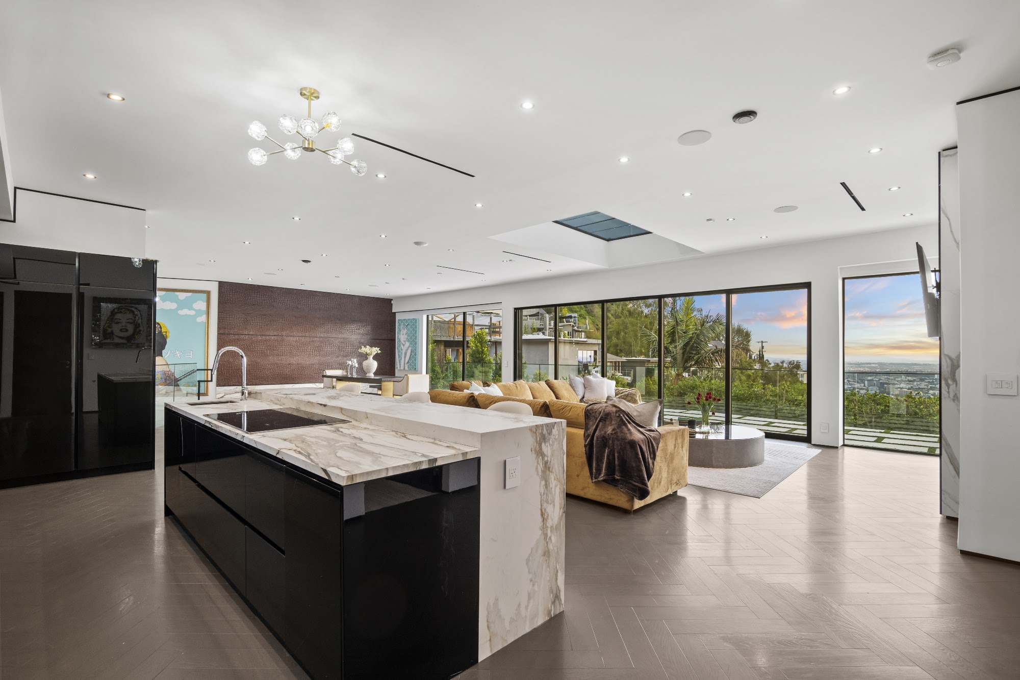 Sunset Plaza Promontory — kitchen with island opening to the terrace