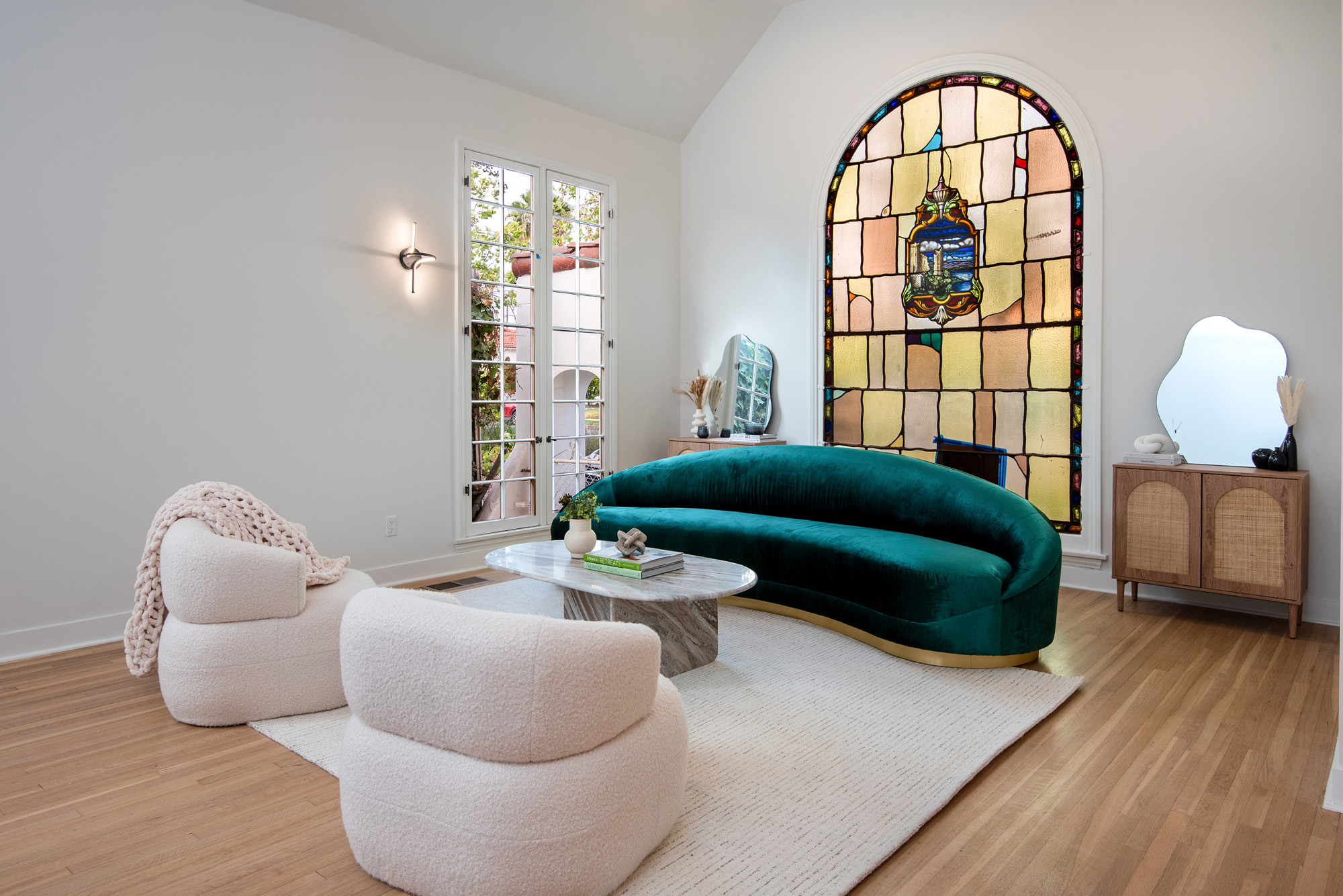 Alta Vista Terrace — living room with a stained-glass arched window