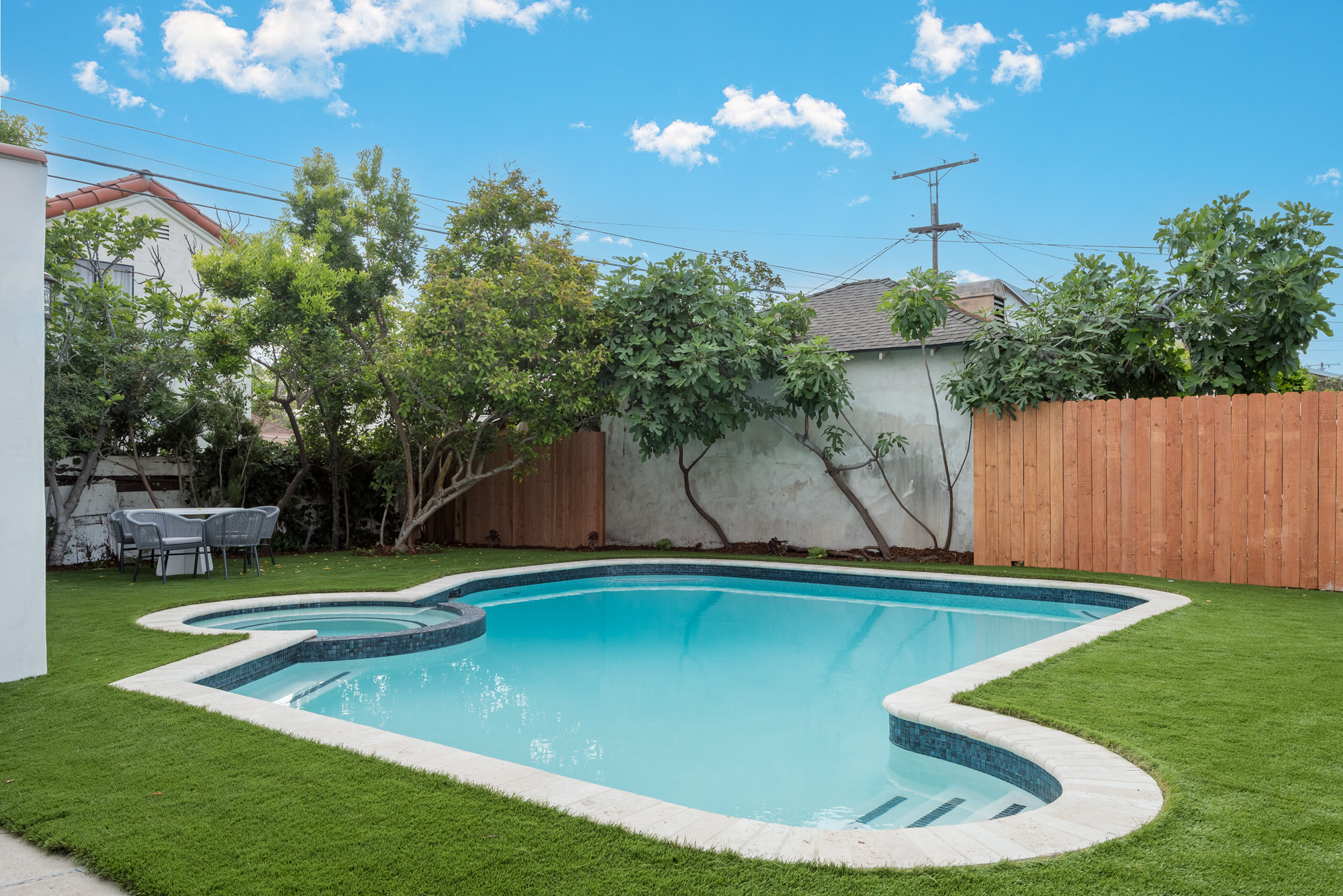 Alta Vista Terrace — pool and lawn behind the house