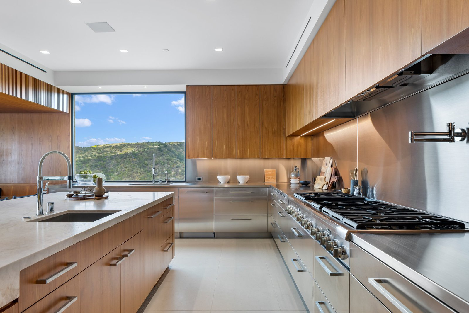 Summitridge Heights — kitchen with island and professional range