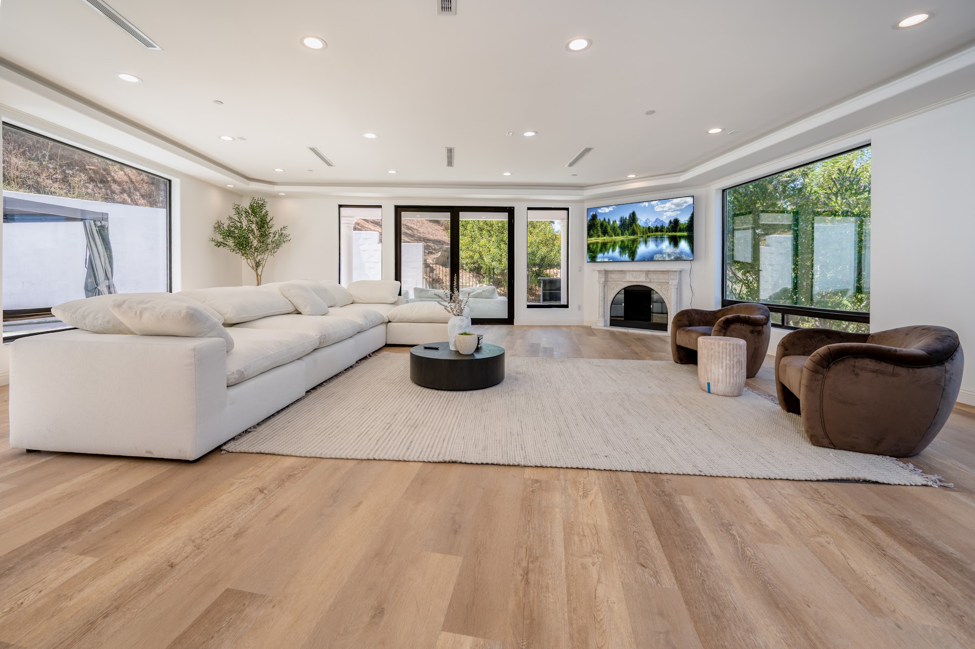 Grimes Olive House — living room with sectional and canyon outlook