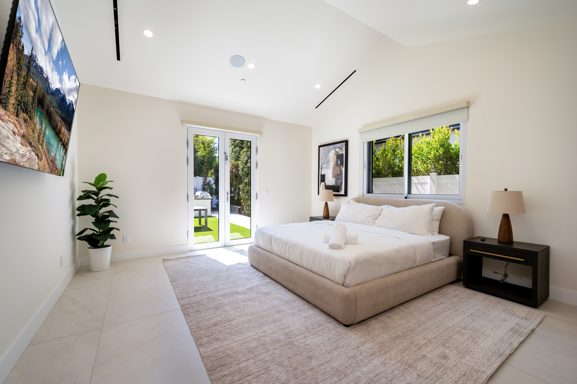 Woodley Orchard House — bedroom opening to the garden
