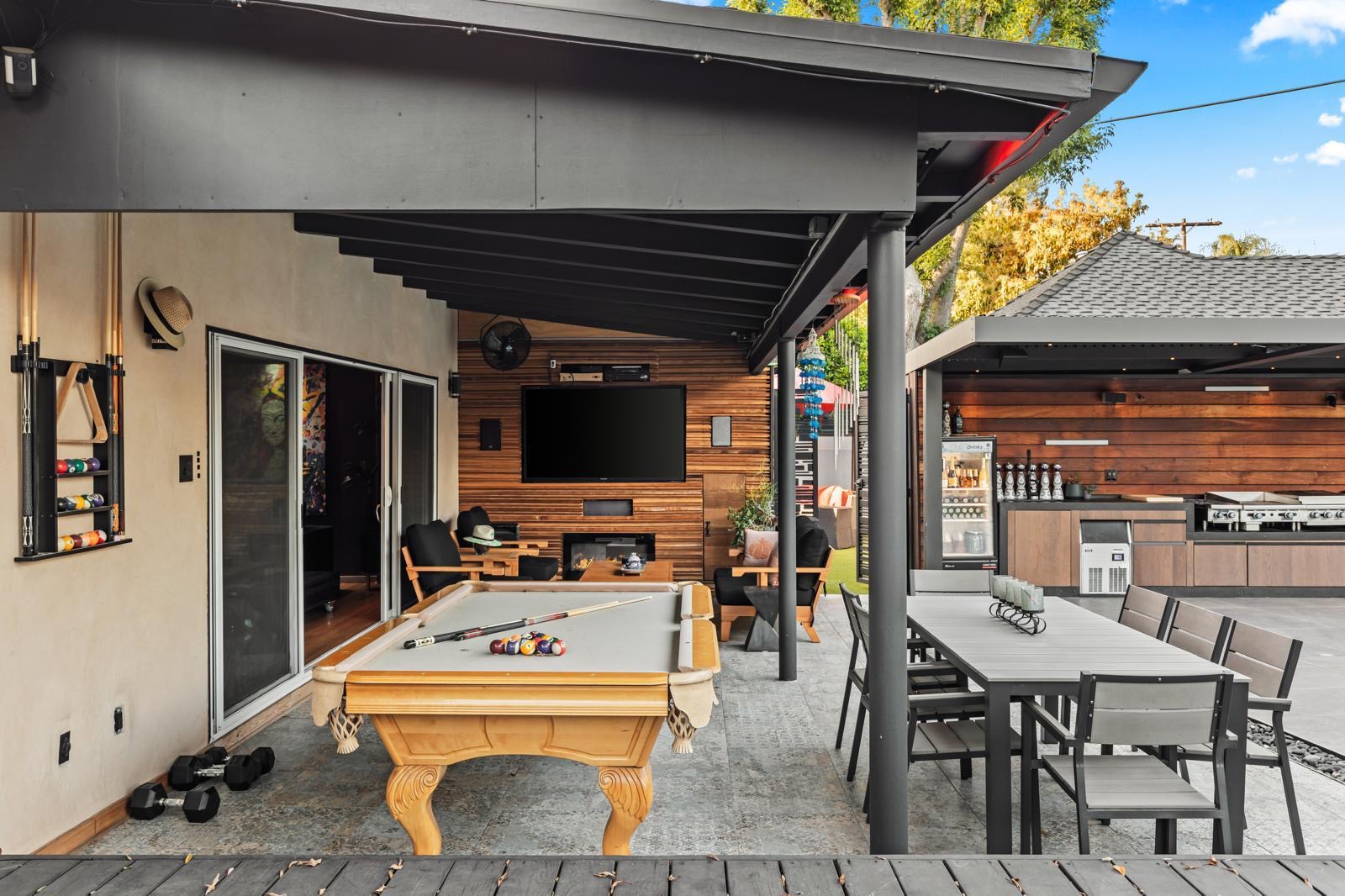 Varna Garden House — covered patio with pool table and outdoor dining