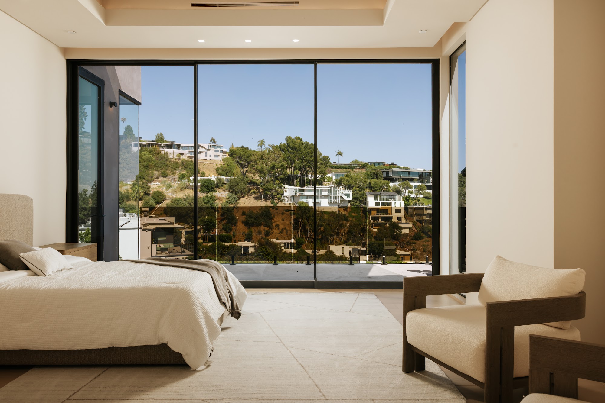 Thrush Eyrie — bedroom with hillside view
