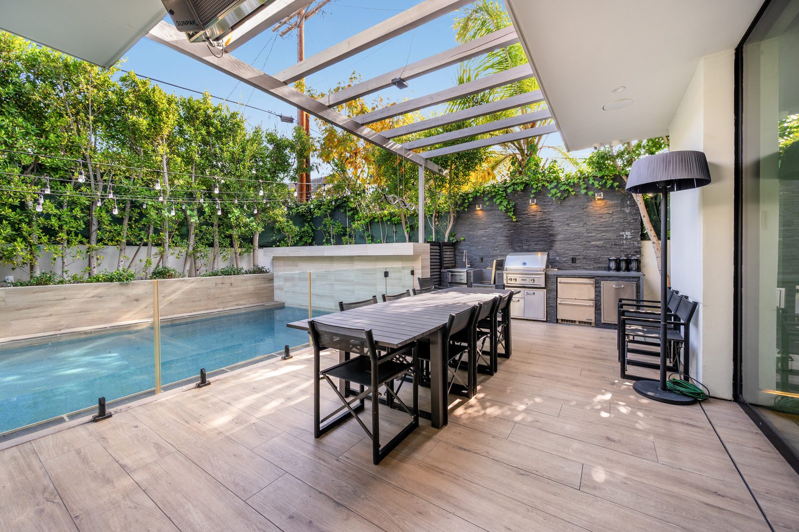 Croft Altana — poolside dining under the pergola